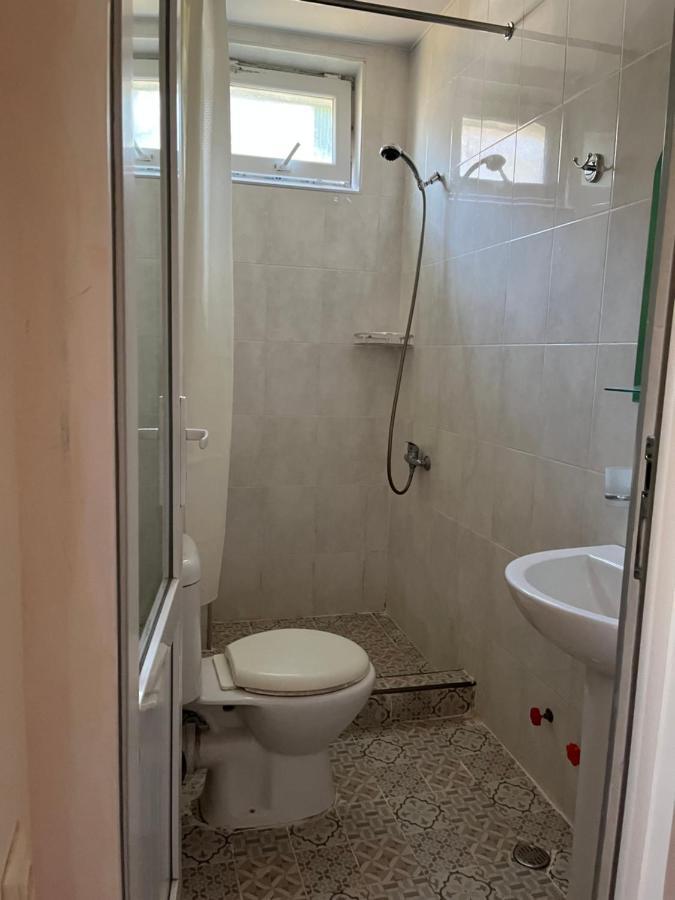 Guest House Nia Gonio Bagian luar foto