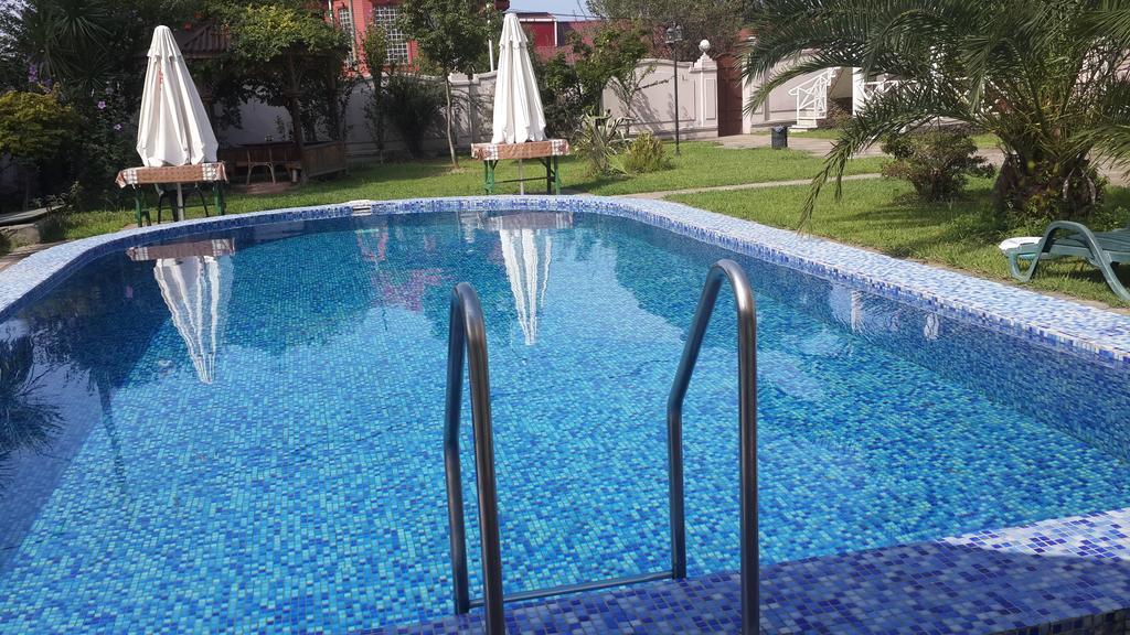 Guest House Nia Gonio Bagian luar foto